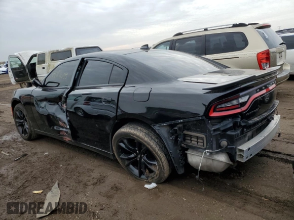 2017 Dodge Charger SXT with VIN 2C3CDXHG6HH606426, listed as a Copart auction lot 52100185 with 122,910 mi miles and Salvage Title. Bid and sale history available at DreamBid. Image 2.