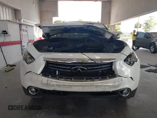 2015 Infiniti QX70 z VIN JN8CS1MU9FM380276, wystawiony jako IAAI lot #42356021 z przebiegiem 98 589 mil mil oraz . Historia ofert i sprzedaży dostępna na DreamBid. Obrazek 12.