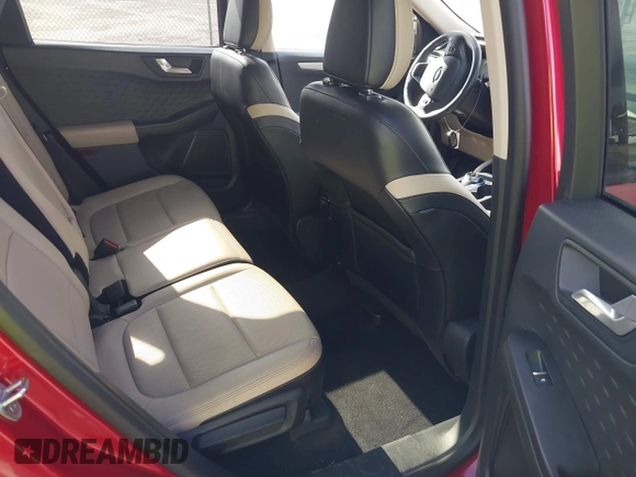 2020 Ford Escape SEL with VIN 1FMCU0H63LUB57993, listed as a IAAI auction lot 42473086 with 71,339 mi miles and . Bid and sale history available at DreamBid. Image 8.