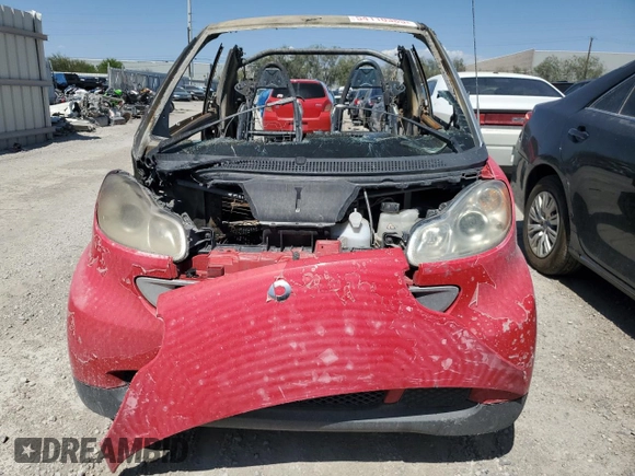 2009 Smart fortwo Passion z VIN WMEEK31X99K211682, wystawiony jako Copart lot #54110385 z przebiegiem Nie podano mil oraz Szkoda całkowita • Salvage title. Historia ofert i sprzedaży dostępna na DreamBid. Obrazek 5.