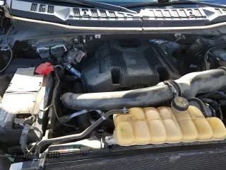 2018 Ford F-150 XLT z VIN 1FTEW1EG1JKC82476, wystawiony jako Copart lot #82260715 z przebiegiem 62 114 mil mil oraz Szkoda całkowita • Salvage title. Historia ofert i sprzedaży dostępna na DreamBid. Obrazek 14.