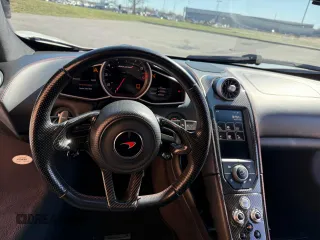 2016 McLaren 650S with VIN SBM11FAAXGW005605, listed as a Copart auction lot 53181285 with 16,800 mi miles and Clean Title. Bid and sale history available at DreamBid. Image 9.
