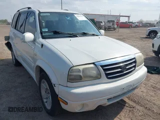 2003 Suzuki XL7 Touring z VIN JS3TY92V534106381, wystawiony jako IAAI lot #42063755 z przebiegiem 190 917 mil mil oraz . Historia ofert i sprzedaży dostępna na DreamBid. Obrazek 1.