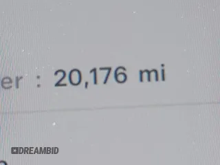2023 Tesla Model Y Long Range z VIN 7SAYGDEE1PA158661, wystawiony jako IAAI lot #41983897 z przebiegiem 20 176 mil mil oraz . Historia ofert i sprzedaży dostępna na DreamBid. Obrazek 7.