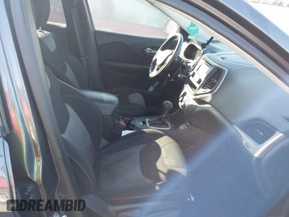 2016 Jeep Cherokee Sport with VIN 1C4PJLAS4GW329773, listed as a IAAI auction lot 41300023 with 101,912 mi miles and . Bid and sale history available at DreamBid. Image 5.