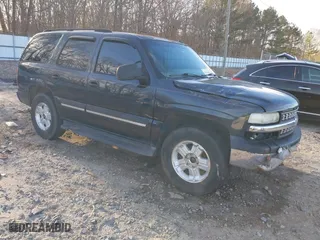2005 Chevrolet Tahoe LS with VIN 1GNEK13T75J126912, listed as a IAAI auction lot 41370116 with 242,937 mi miles. Bid and sale history available at carsss.com. Image 1.