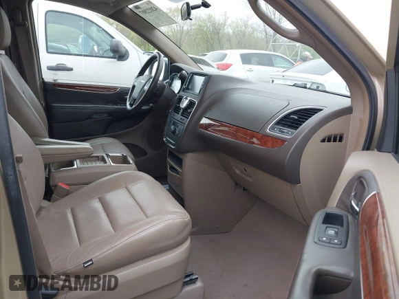 2011 Chrysler Town & Country Touring with VIN 2A4RR5DGXBR666934, listed as a IAAI auction lot 42022807 with 125,920 mi miles and . Bid and sale history available at DreamBid. Image 5.