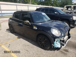 2016 MINI Hardtop 4 Door S with VIN WMWXU3C58G2B67264, listed as a Copart auction lot 61454215 with 66,550 mi miles and Salvage title. Bid and sale history available at DreamBid. Image 4.