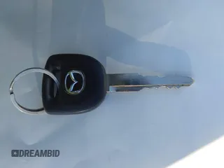 2013 Mazda 3 i SV with VIN JM1BL1TG3D1811032, listed as a IAAI auction lot 41603113 with 125,610 mi miles and . Bid and sale history available at DreamBid. Image 11.