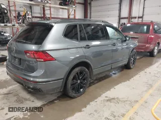 2022 Volkswagen Tiguan SE R-Line Black with VIN 3VV8B7AX9NM103988, listed as a IAAI auction lot 41908814 with 43,671 mi miles and . Bid and sale history available at DreamBid. Image 4.