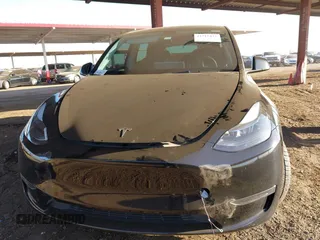 2023 Tesla Model Y Long Range with VIN 7SAYGDEE8PF815622, listed as a IAAI auction lot 41515433 with 70,862 mi miles and . Bid and sale history available at DreamBid. Image 12.