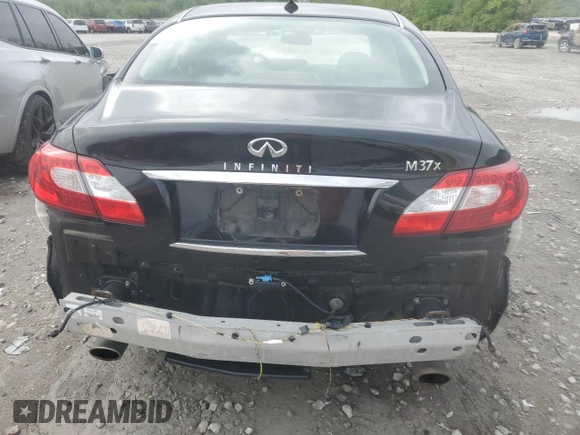 2013 Infiniti M z VIN JN1BY1AR5DM604133, wystawiony jako Copart lot #56890095 z przebiegiem 202 593 mil mil oraz Szkoda całkowita • Salvage title. Historia ofert i sprzedaży dostępna na DreamBid. Obrazek 6.