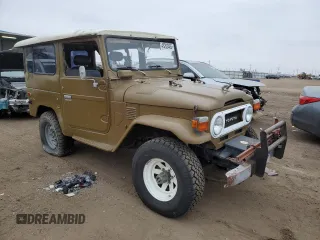 1977 Toyota Land Cruiser z VIN FJ40249180, wystawiony jako Copart lot #43203465 z przebiegiem 180 762 mil mil oraz Czysty tytuł • Clean title. Historia ofert i sprzedaży dostępna na DreamBid. Obrazek 4.