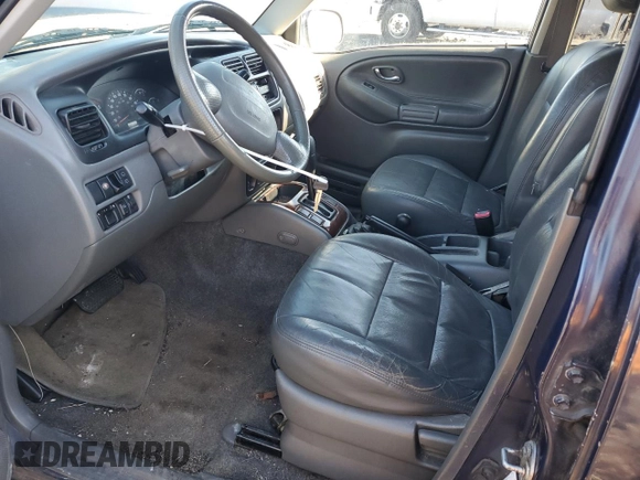 2002 Suzuki XL7 Standard with VIN JS3TX92VX24117328, listed as a Copart auction lot 49181005 with 80,458 mi miles and Salvage title. Bid and sale history available at DreamBid. Image 7.