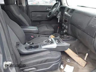 2008 Hummer H3 SUV with VIN 5GTEN13E088133349, listed as a IAAI auction lot 41587403 with Not Provided miles and . Bid and sale history available at DreamBid. Image 5.