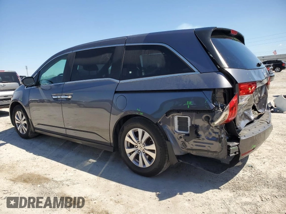 2016 Honda Odyssey EX-L with VIN 5FNRL5H6XGB100929, listed as a Copart auction lot 48889205 with 148,766 mi miles and Salvage Title. Bid and sale history available at DreamBid. Image 2.