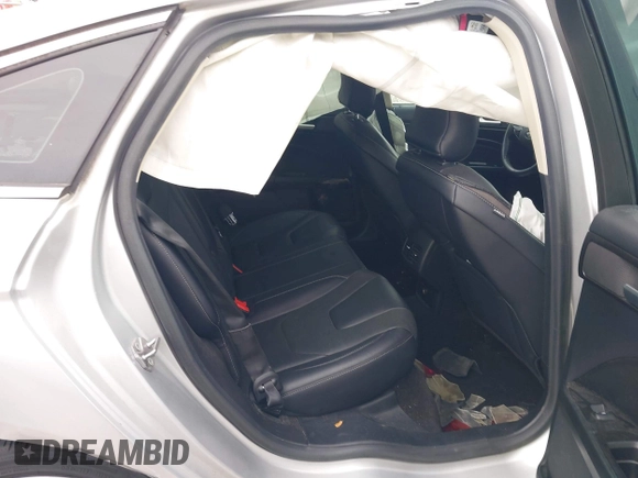 2019 Ford Fusion Titanium with VIN 3FA6P0K96KR120749, listed as a IAAI auction lot 40737085 with 118,376 mi miles and . Bid and sale history available at DreamBid. Image 8.