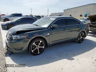 2016 Ford Taurus SEL with VIN 1FAHP2E82GG137957, listed as a Copart auction lot 65397705 with 231,257 mi miles and Salvage title. Bid and sale history available at DreamBid. Image 1.
