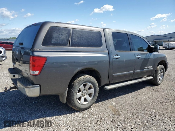 2005 Nissan Titan LE with VIN 1N6BA07B95N571880, listed as a Copart auction lot 57527435 with 199,577 mi miles and Salvage title. Bid and sale history available at DreamBid. Image 3.