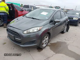 2018 Ford Fiesta SE with VIN 3FADP4BJXJM136232, listed as a IAAI auction lot 41901540 with 119,065 mi miles and . Bid and sale history available at DreamBid. Image 2.