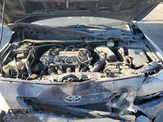 2010 Toyota Corolla with VIN 2T1BU4EE1AC363990, listed as a Copart auction lot 52001595 with 244,000 mi miles and Salvage title. Bid and sale history available at DreamBid. Image 11.