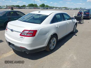 2015 Ford Taurus SEL z VIN 1FAHP2E82FG105766, wystawiony jako IAAI lot #42327700 z przebiegiem 187 185 mil mil oraz . Historia ofert i sprzedaży dostępna na DreamBid. Obrazek 4.
