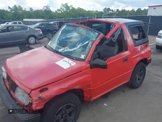 1995 Chevrolet Tracker z VIN 2CNBJ1869S6902771, wystawiony jako IAAI lot #41997456 z przebiegiem 171 629 mil mil oraz . Historia ofert i sprzedaży dostępna na DreamBid. Obrazek 6.
