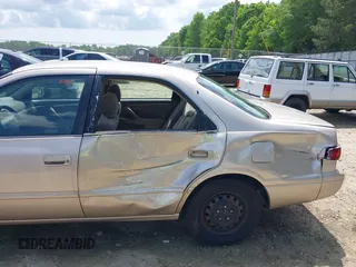 1997 Toyota Camry LE z VIN 4T1BG22K7VU818805, wystawiony jako IAAI lot #42105925 z przebiegiem 140 960 mil mil oraz . Historia ofert i sprzedaży dostępna na DreamBid. Obrazek 6.