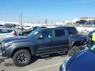 2020 Toyota Tacoma SR5 with VIN 3TMCZ5AN2LM351472, listed as a IAAI auction lot 41621286 with 48,402 mi miles and . Bid and sale history available at DreamBid. Image 14.