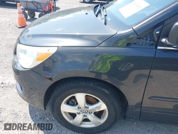 2011 Volkswagen Routan SE with VIN 2V4RW3DGXBR669762, listed as a IAAI auction lot 42693493 with 105,415 mi miles and . Bid and sale history available at DreamBid. Image 14.