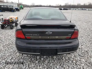 1999 Chevrolet Monte Carlo LS z VIN 2G1WW12M3X9280133, wystawiony jako Copart lot #81814554 z przebiegiem 81 630 mil mil oraz Szkoda całkowita • Salvage title. Historia ofert i sprzedaży dostępna na DreamBid. Obrazek 6.