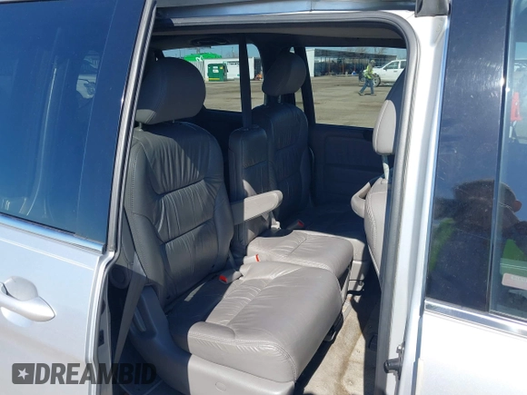 2010 Honda Odyssey Touring with VIN 5FNRL3H97AB015472, listed as a IAAI auction lot 41763680 with 144,309 mi miles. Bid and sale history available at carsss.com. Image 8.