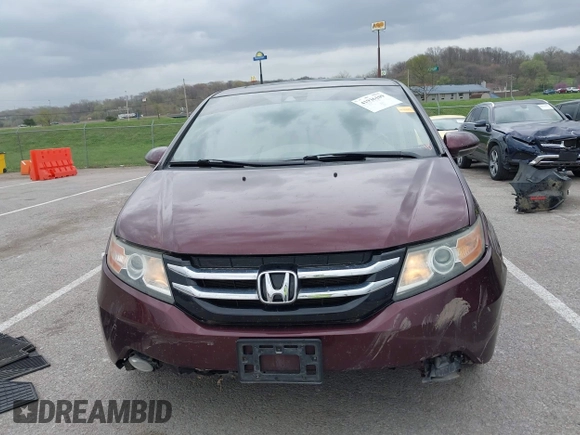 2014 Honda Odyssey Touring with VIN 5FNRL5H94EB127695, listed as a IAAI auction lot 41936109 with 221,786 mi miles and . Bid and sale history available at DreamBid. Image 12.