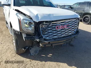 2020 GMC Yukon Denali with VIN 1GKS2CKJ3LR260455, listed as a IAAI auction lot 41690495 with 92,498 mi miles. Bid and sale history available at carsss.com. Image 6.