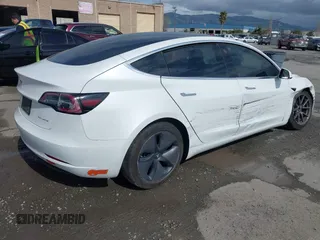 2020 Tesla Model 3 Long Range with VIN 5YJ3E1EB6LF619528, listed as a IAAI auction lot 41937430 with 70,327 mi miles. Bid and sale history available at carsss.com. Image 4.