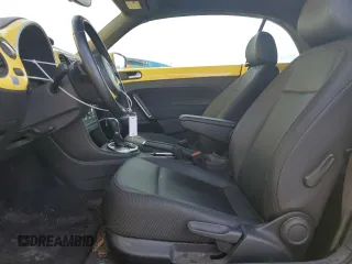 2015 Volkswagen Beetle with VIN 3VW5A7AT9FM816065, listed as a Copart auction lot 45418085 with 94,419 mi miles and Salvage Title. Bid and sale history available at DreamBid. Image 7.