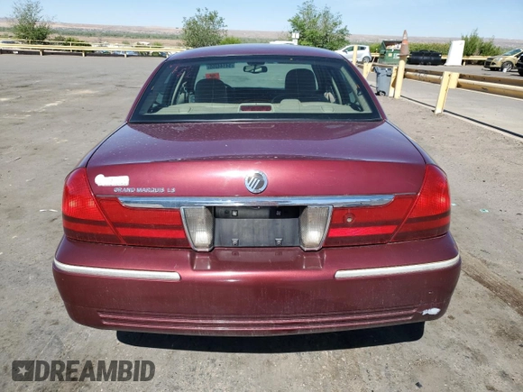 2004 Mercury Grand Marquis LS Premium z VIN 2MEHM75W34X636723, wystawiony jako Copart lot #54144055 z przebiegiem 161 886 mil mil oraz Szkoda całkowita • Salvage title. Historia ofert i sprzedaży dostępna na DreamBid. Obrazek 6.