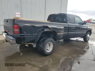 1999 Dodge Ram 3500 with VIN 1B7MC3361XJ624548, listed as a Copart auction lot 77225594 with 193,623 mi miles and Salvage Title. Bid and sale history available at carsss.com. Image 3.