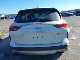 2020 Infiniti QX50 Essential with VIN 3PCAJ5M37LF111864, listed as a IAAI auction lot 41448436 with 54,337 mi miles and . Bid and sale history available at DreamBid. Image 16.