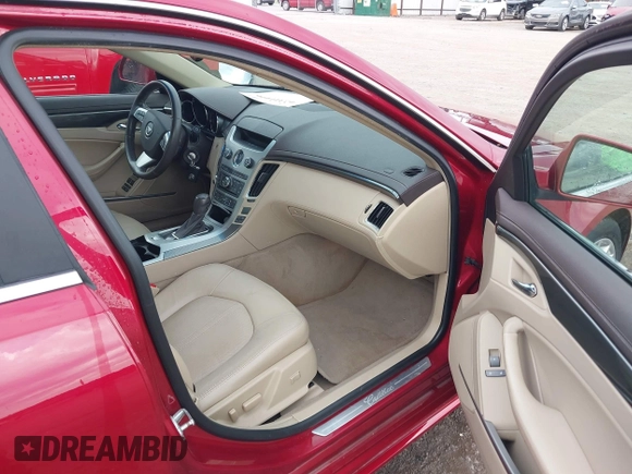 2013 Cadillac CTS Performance with VIN 1G6DK5E3XD0117945, listed as a IAAI auction lot 42341416 with 67,428 mi miles and . Bid and sale history available at DreamBid. Image 5.