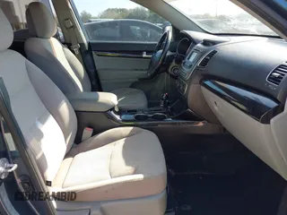 2014 Kia Sorento LX with VIN 5XYKT4A71EG462295, listed as a IAAI auction lot 41508742 with 144,234 mi miles and . Bid and sale history available at carsss.com. Image 5.