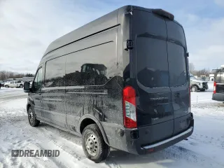 2020 Ford Transit Cargo with VIN 1FTBR2X81LKB73704, listed as a Copart auction lot 87871045 with 184,672 mi miles and Clean Title. Bid and sale history available at DreamBid. Image 2.