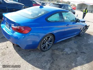 2015 BMW 4 Series 435i with VIN WBA3R1C56FK193975, listed as a IAAI auction lot 41293103 with 102,188 mi miles. Bid and sale history available at carsss.com. Image 4.