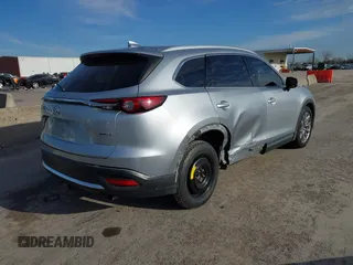 2020 Mazda CX-9 Grand Touring z VIN JM3TCADY7L0416696, wystawiony jako IAAI lot #41310183 z przebiegiem 105 754 mil mil oraz . Historia ofert i sprzedaży dostępna na DreamBid. Obrazek 4.