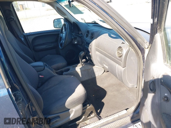 2003 Jeep Liberty Sport with VIN 1J4GL48K83W663248, listed as a IAAI auction lot 42056561 with 161,652 mi miles. Bid and sale history available at carsss.com. Image 5.