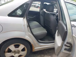 2006 Ford Focus S with VIN 1FAHP34N36W225465, listed as a IAAI auction lot 42670539 with 155,694 mi miles and . Bid and sale history available at DreamBid. Image 8.