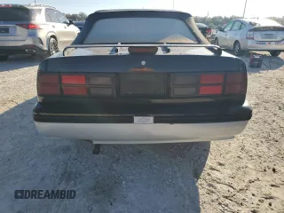 1989 Chevrolet Cavalier with VIN 1G1JF31W1K7190840, listed as a Copart auction lot 77747934 with Not Provided miles and Salvage Title. Bid and sale history available at DreamBid. Image 6.