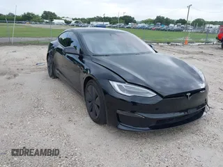 2022 Tesla Model S with VIN 5YJSA1E51NF472152, listed as a IAAI auction lot 42625943 with 60,290 mi miles and . Bid and sale history available at DreamBid. Image 1.