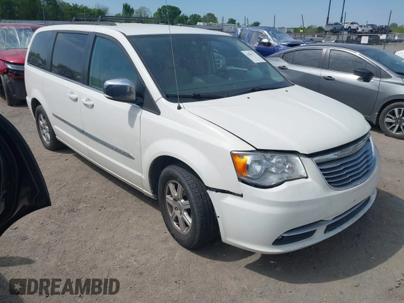 2012 Chrysler Town & Country Touring L with VIN 2C4RC1CG7CR156415, listed as a IAAI auction lot 42045371 with 233,306 mi miles and . Bid and sale history available at carsss.com. Image 1.