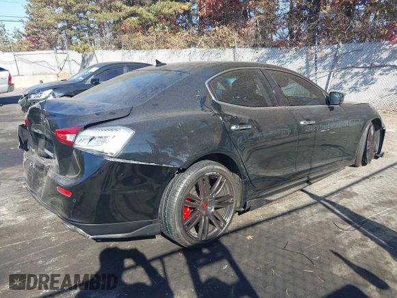 2014 Maserati Ghibli S Q4 z VIN ZAM57RTA9E1106695, wystawiony jako IAAI lot #40783416 z przebiegiem 92 885 mil mil oraz . Historia ofert i sprzedaży dostępna na DreamBid. Obrazek 4.